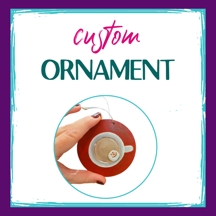 Graphic reads custom ornament. Features a hand holding a small wood ornament with handpainted hot cocoa and snowman marshmallow. Kellie Sansone Creates custom ornament