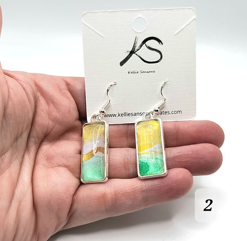 handpainted acrylic abstract design yellow. white, gold, and green swirls