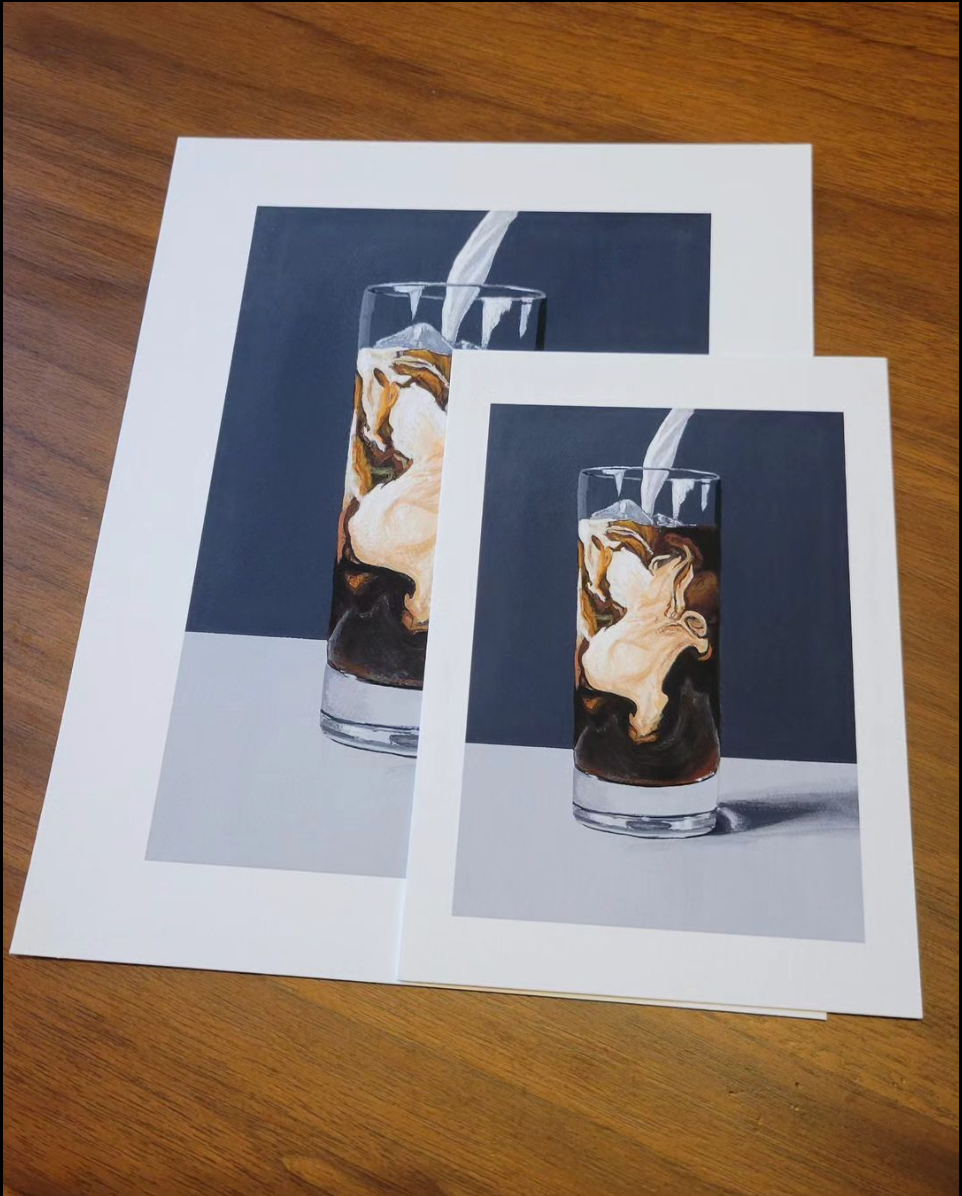 print with iced coffee and milk pouring from top for a creamy swirl design