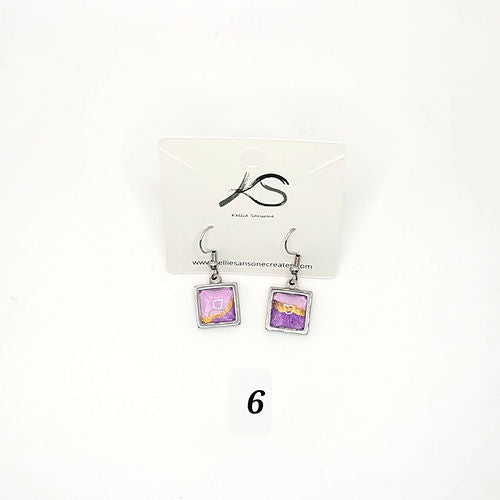handpainted acrylic abstract design with pink, gold, and purple swirls